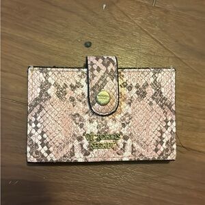 2 purses 2 wallets 1 backpack